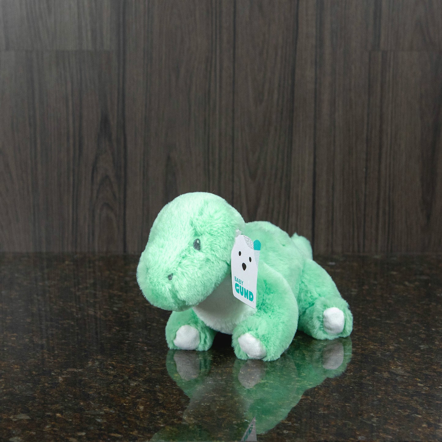 a light green pastel dinosaur plushie