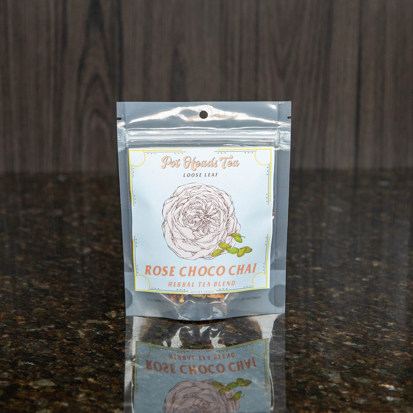 a packet of loose leaf tea with a light blue label