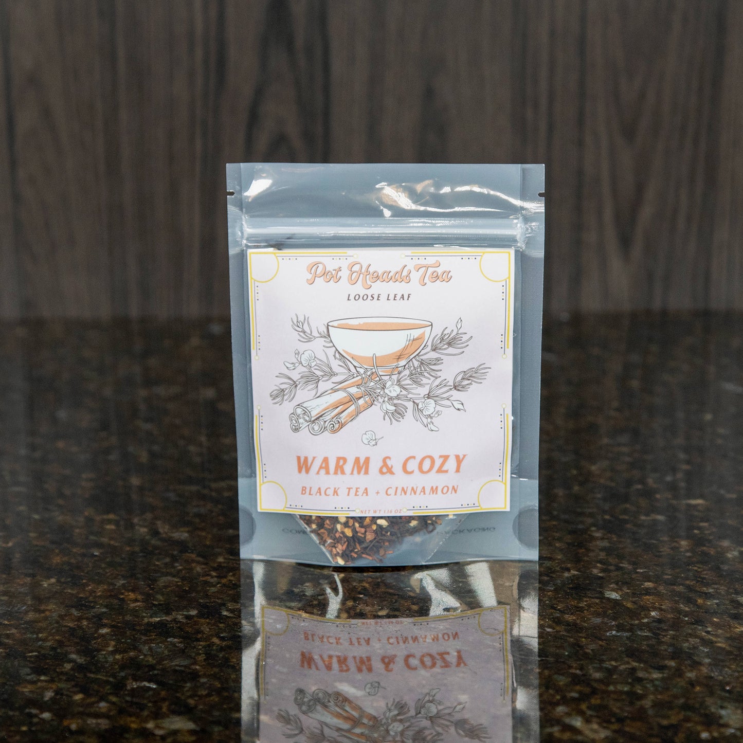 a packet of loose leaf tea with a pink label