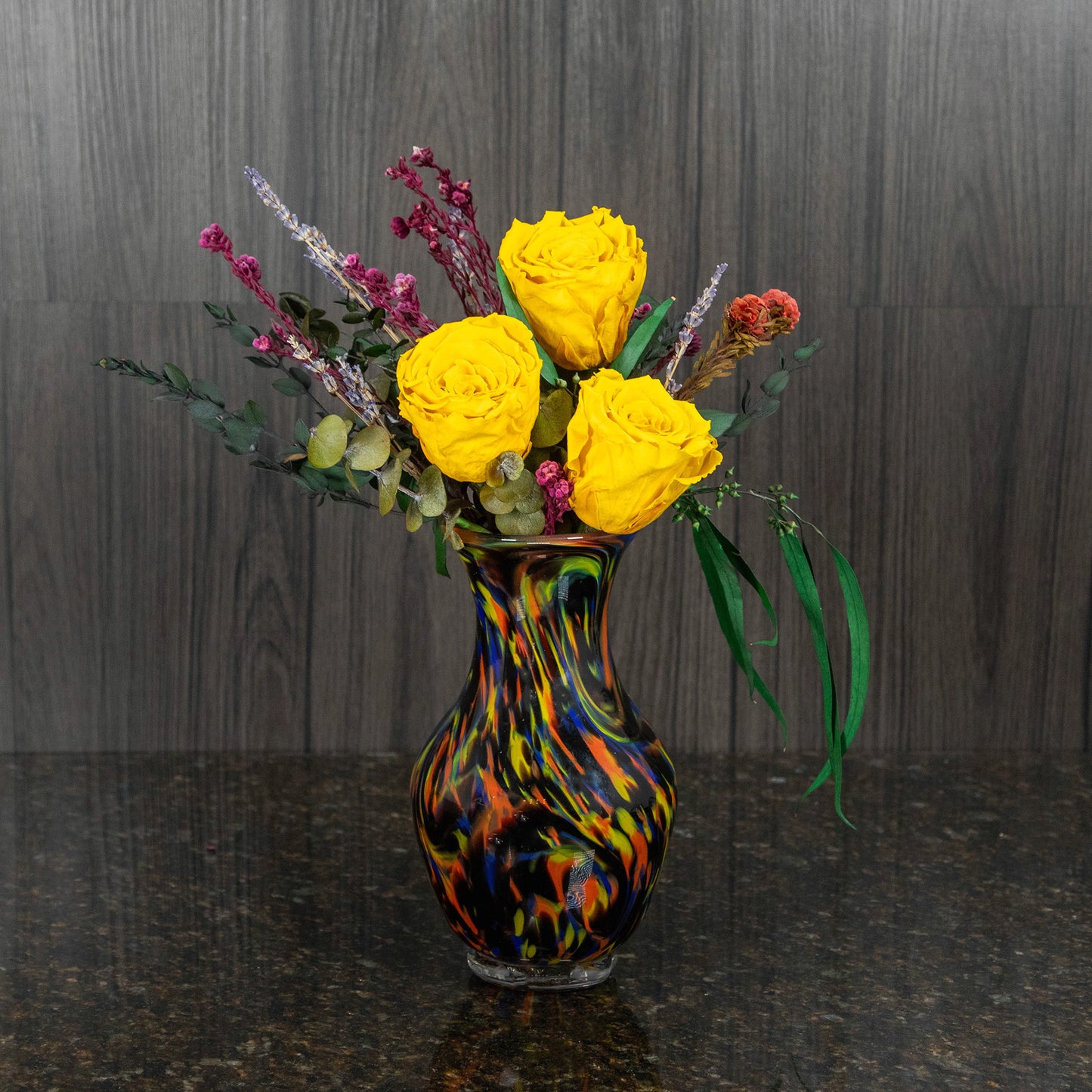 3 Preserved Yellow Roses in Colorful Glass Vase