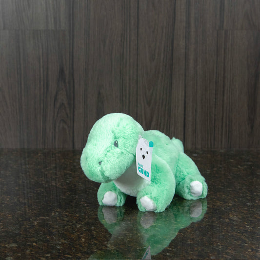 a light green pastel dinosaur plushie