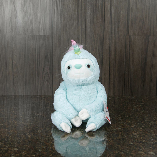 a blue plush slothicorn toy