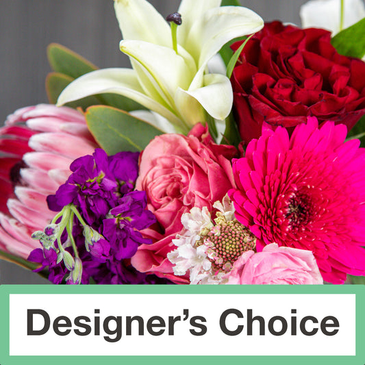 an image of a mix of flowers with text at the bottom saying "designer's choice'