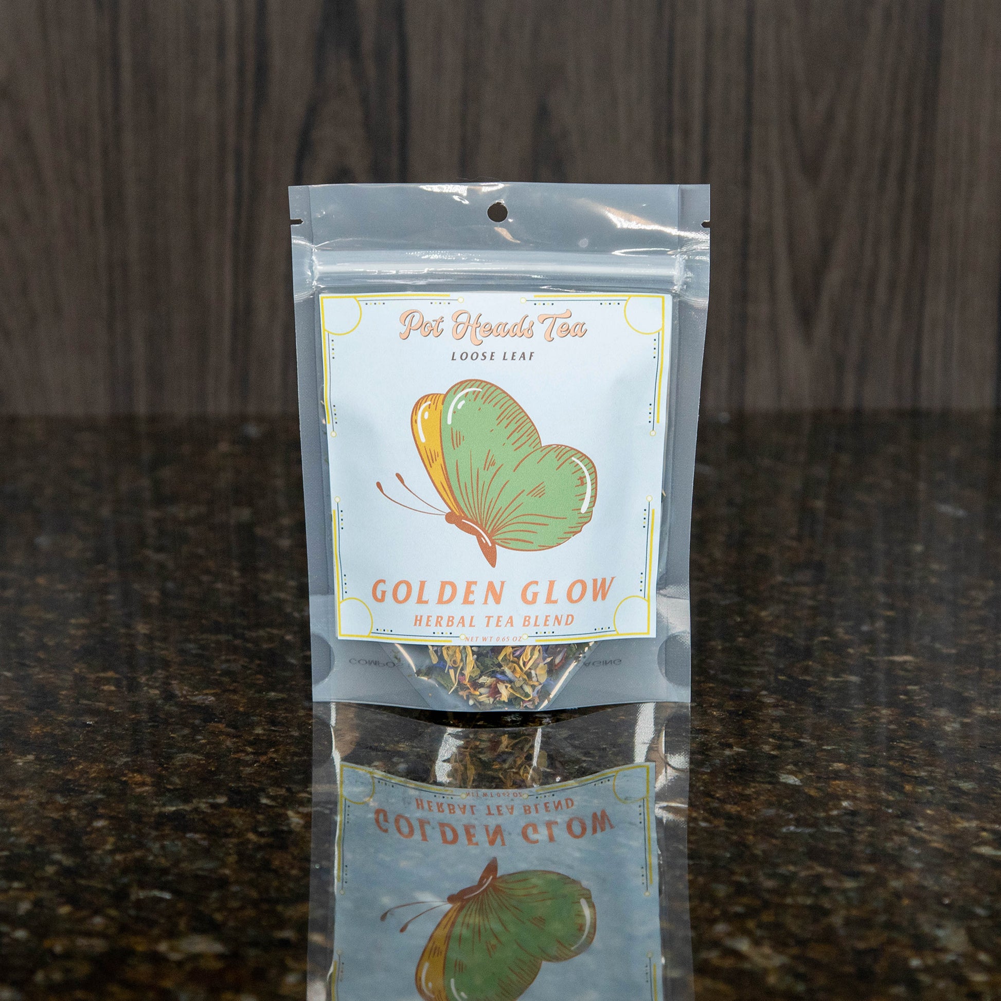 a packet of loose leaf tea with a light blue label