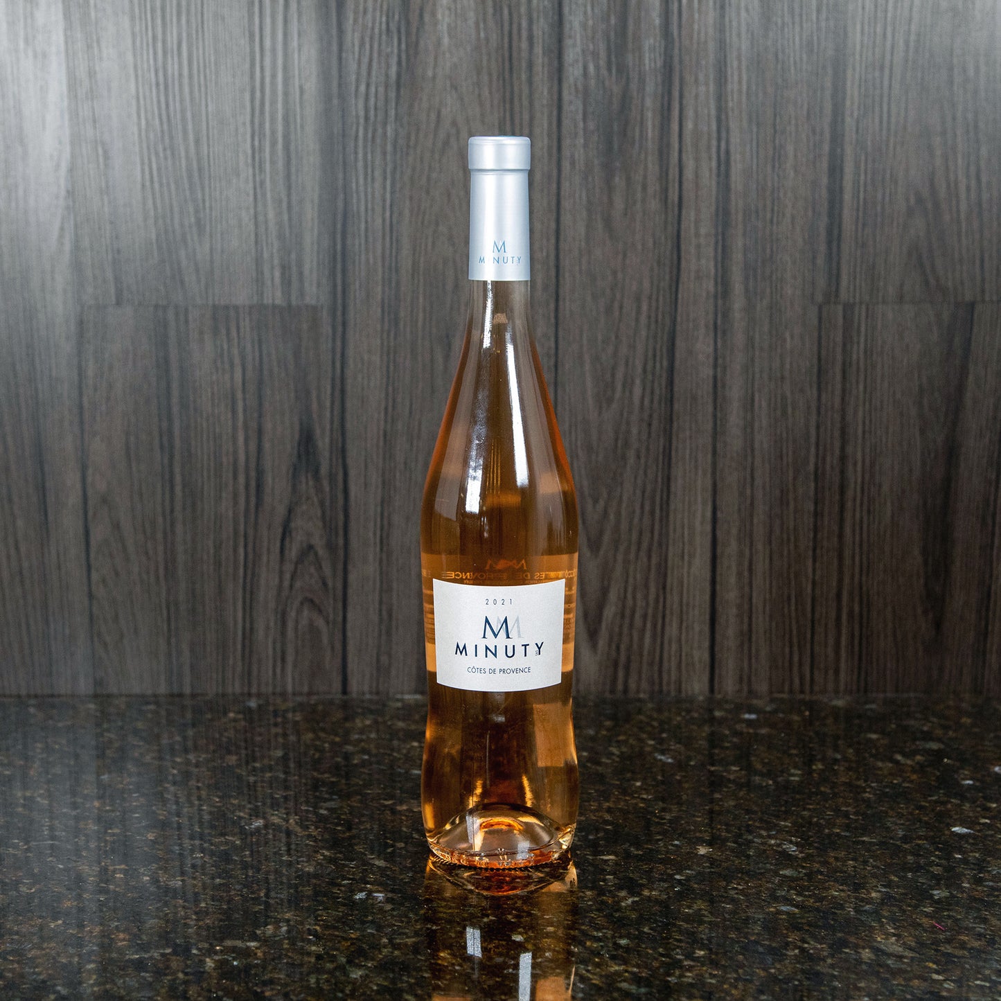 a tall, slender bottle of rosé from Chateau Minuty