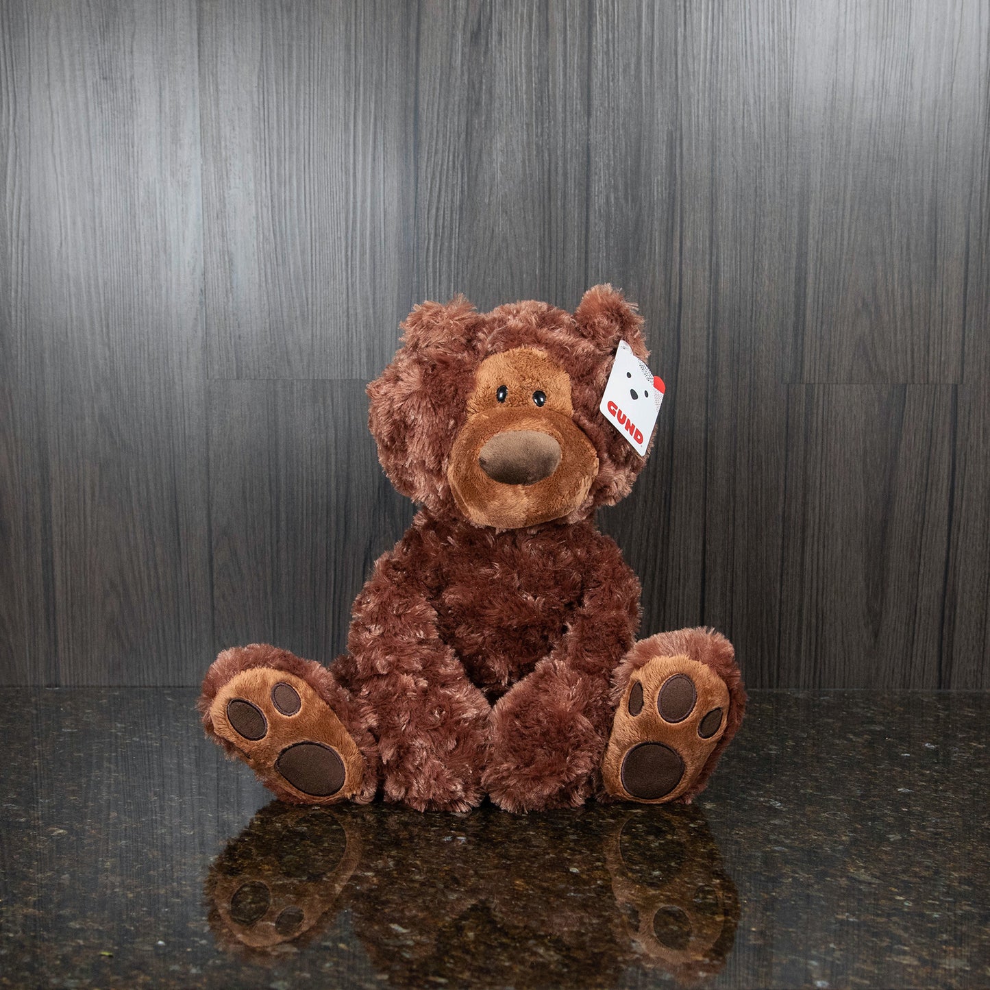 a big, soft, and cuddly brown teddy bear