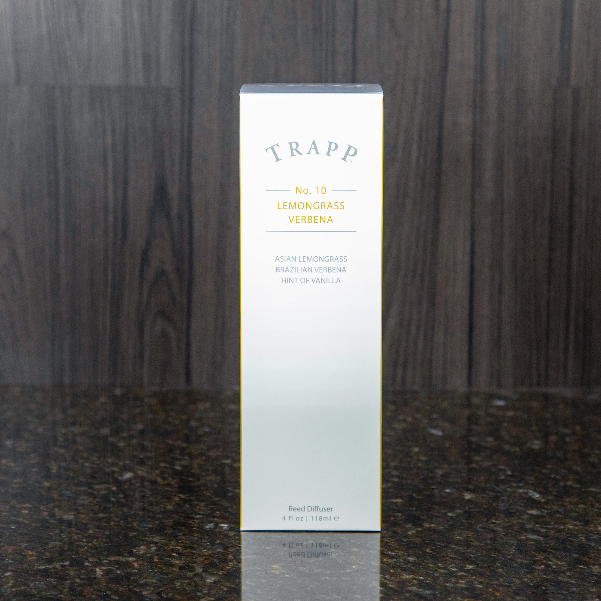a reed diffuser kit from trapp fragrances in the white box it comes in